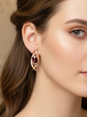 Elegant Gold Tone Earrings with Deep Purple Gemstone